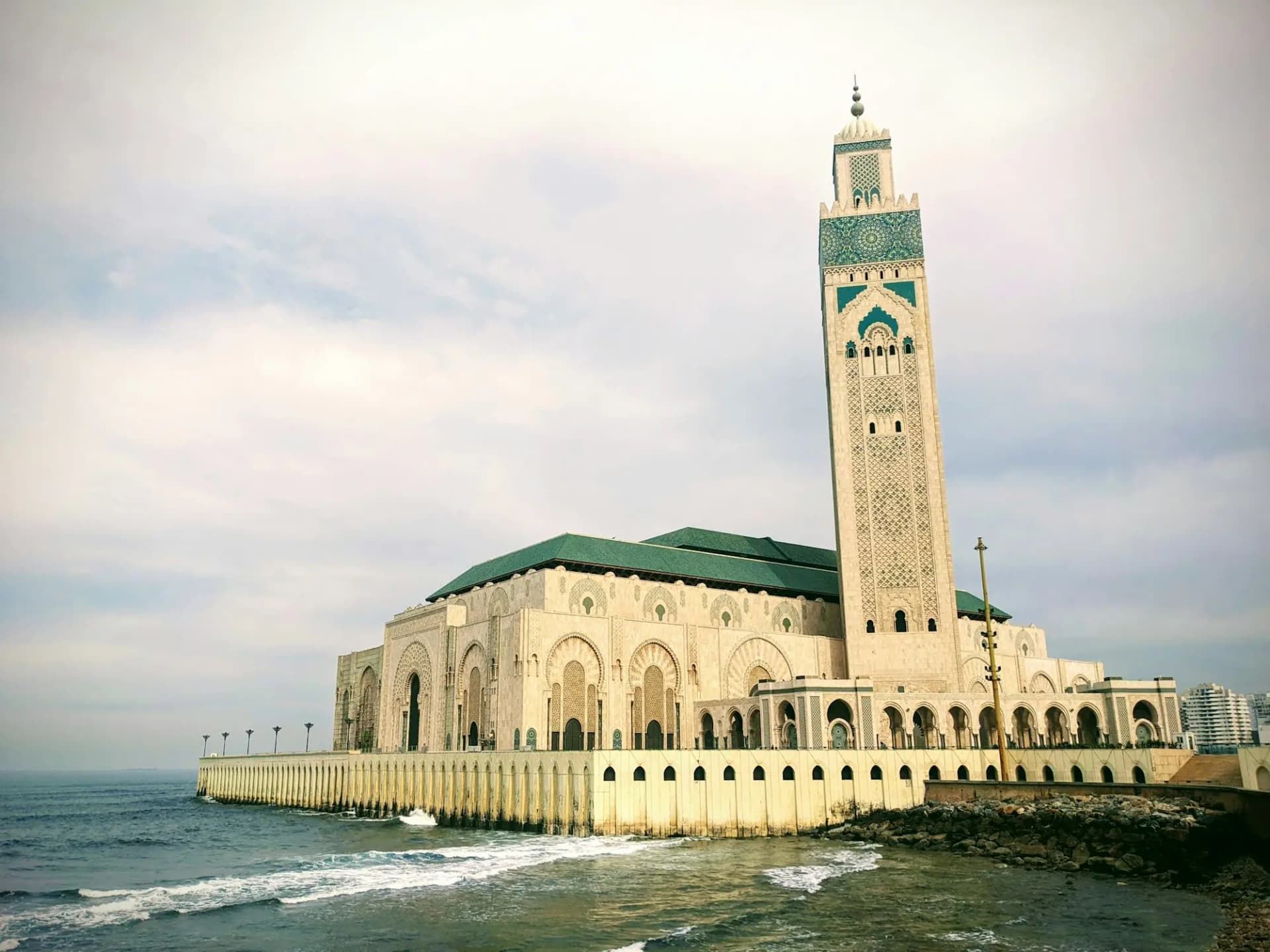 The Hassan II Mosque and its minaret on the Atlantic shore in Casablanca